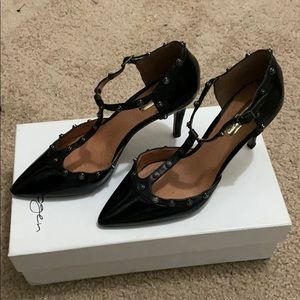 Black studded pumps
